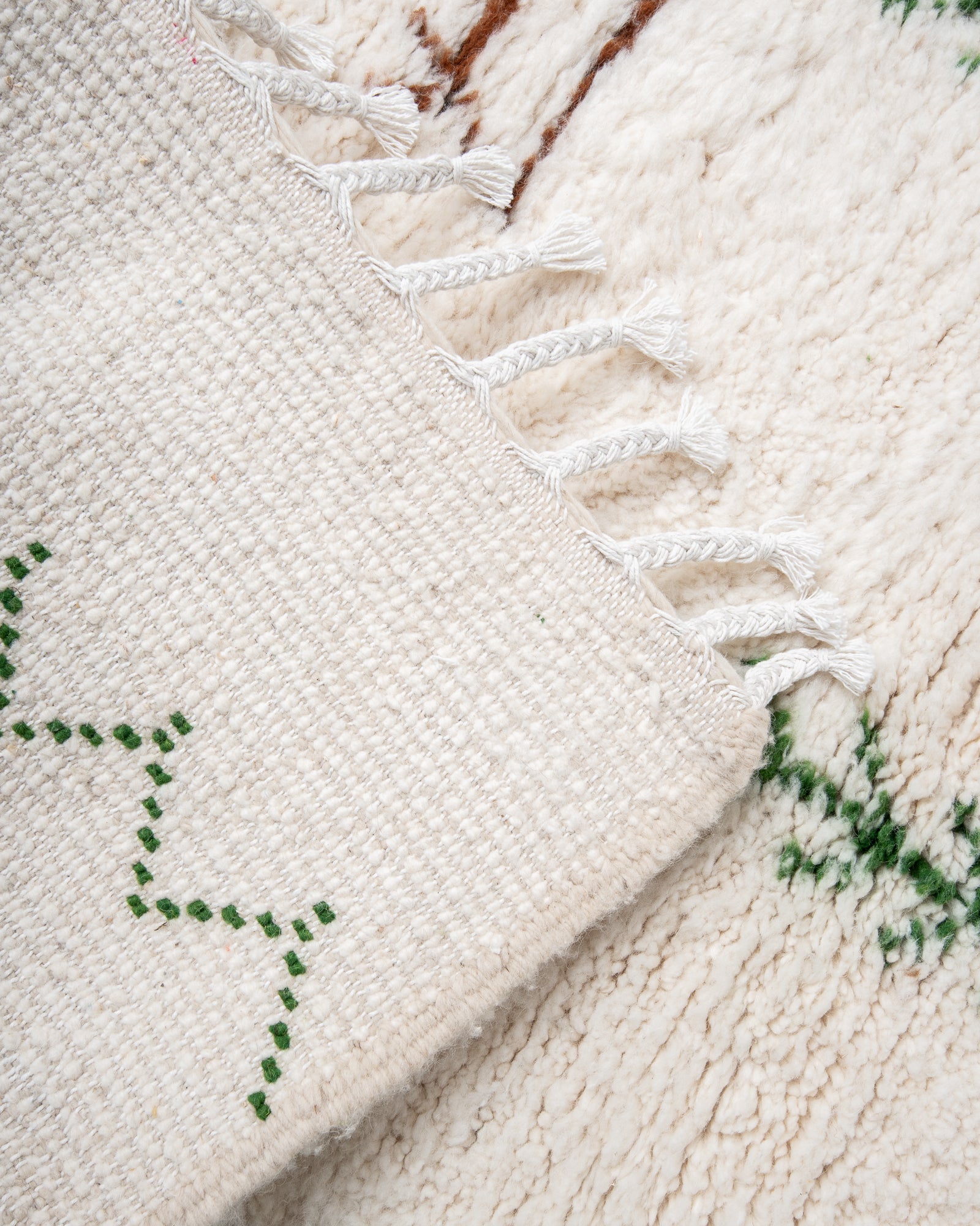 Modern, designer, handcrafted Berber rug from Morocco. Beniourain carpet with beautiful colours and patterns and fluffy wool texture.